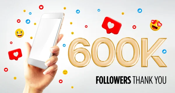 600k-followers-celebration-hand-holding-mobile-smartphone-with-blank-screen-3d-rendering