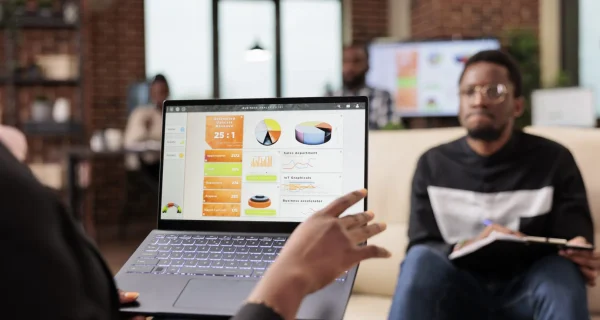 african-american-business-people-analyzing-company-charts-diagrams-laptop-create-startup-presentation-paperwork-report-doing-teamwork-collaboration-plan-research-information