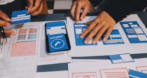 designer-team-is-designing-uxui-system-make-uxui-system-work-well-new-phones-support-system-updates-website-development-concept-ui-ux-front-end-designer