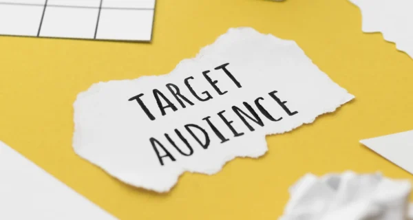 high-angle-target-audience-written-piece-paper